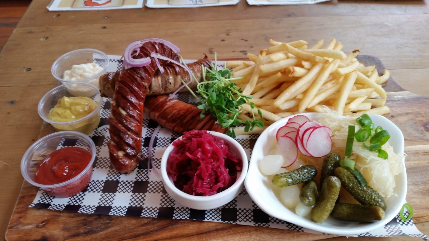 Tasting Platter of their three sausages, fries and pickled vegetables