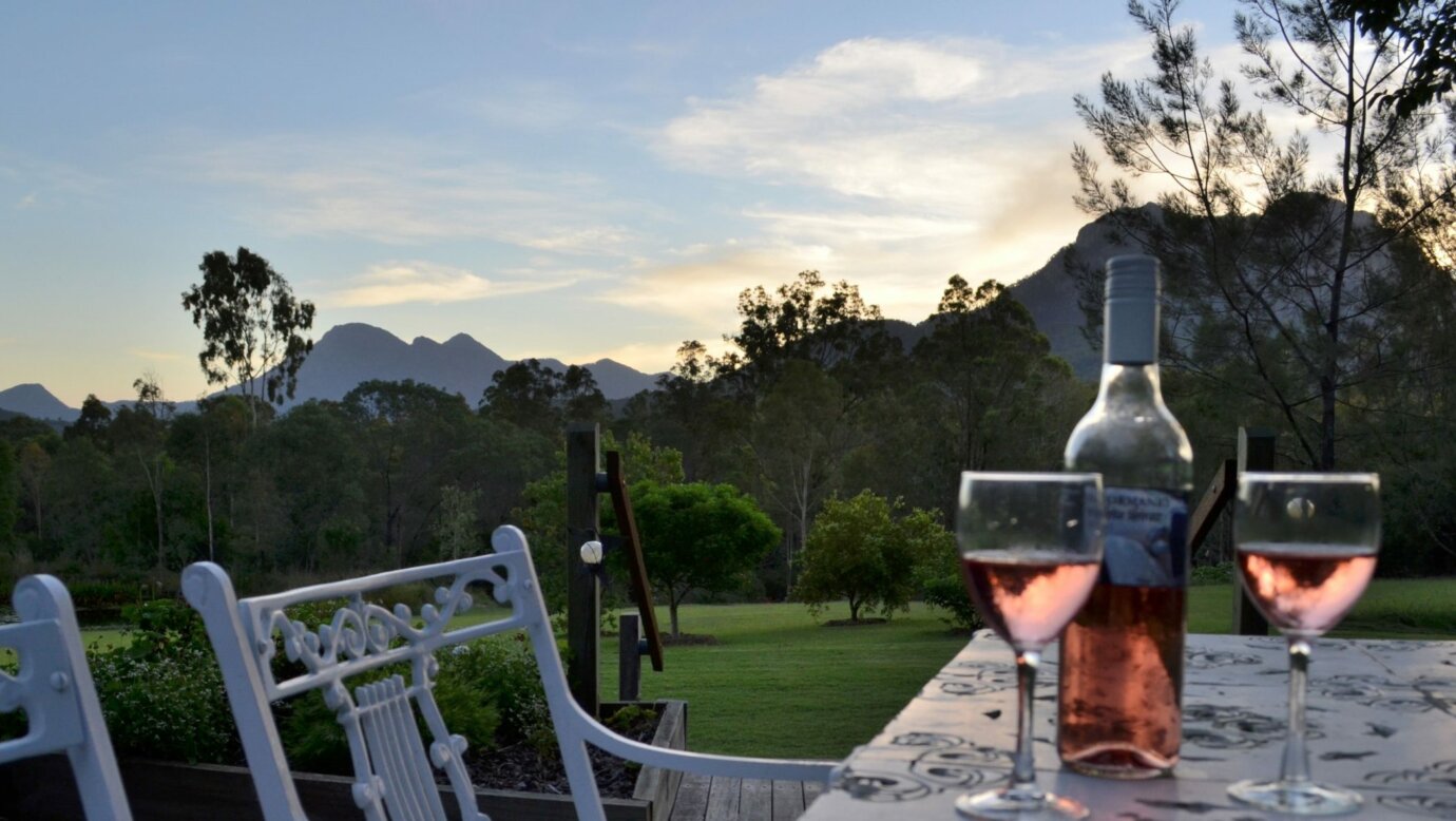 Enjoy a wine whilst taking in the view of Mt Barney and Mt Maroon
