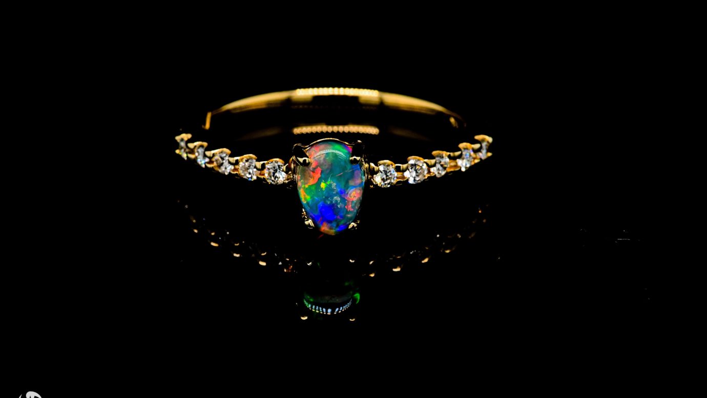 Gold Ring with Blue, Green and Red patten Opal and Diamonds