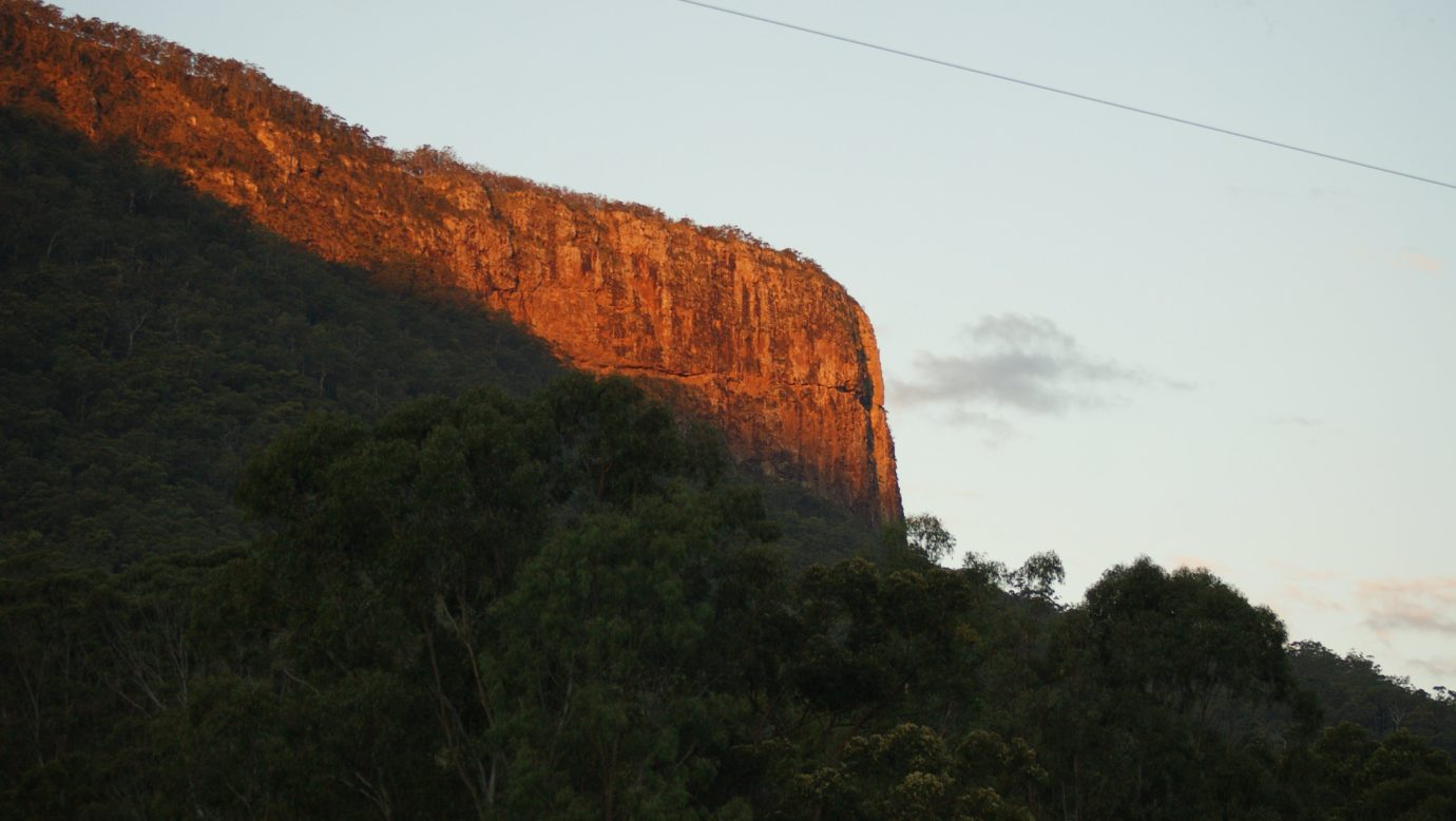 Buchan's Fort, the backdrop to Cave Rock Cottages at sunset