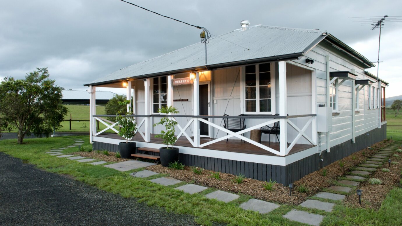 Enjoy a bath with a view in this newly renovated three bedroom cottage with open plan living .