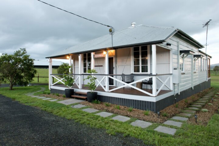 Enjoy a bath with a view in this newly renovated three bedroom cottage with open plan living .