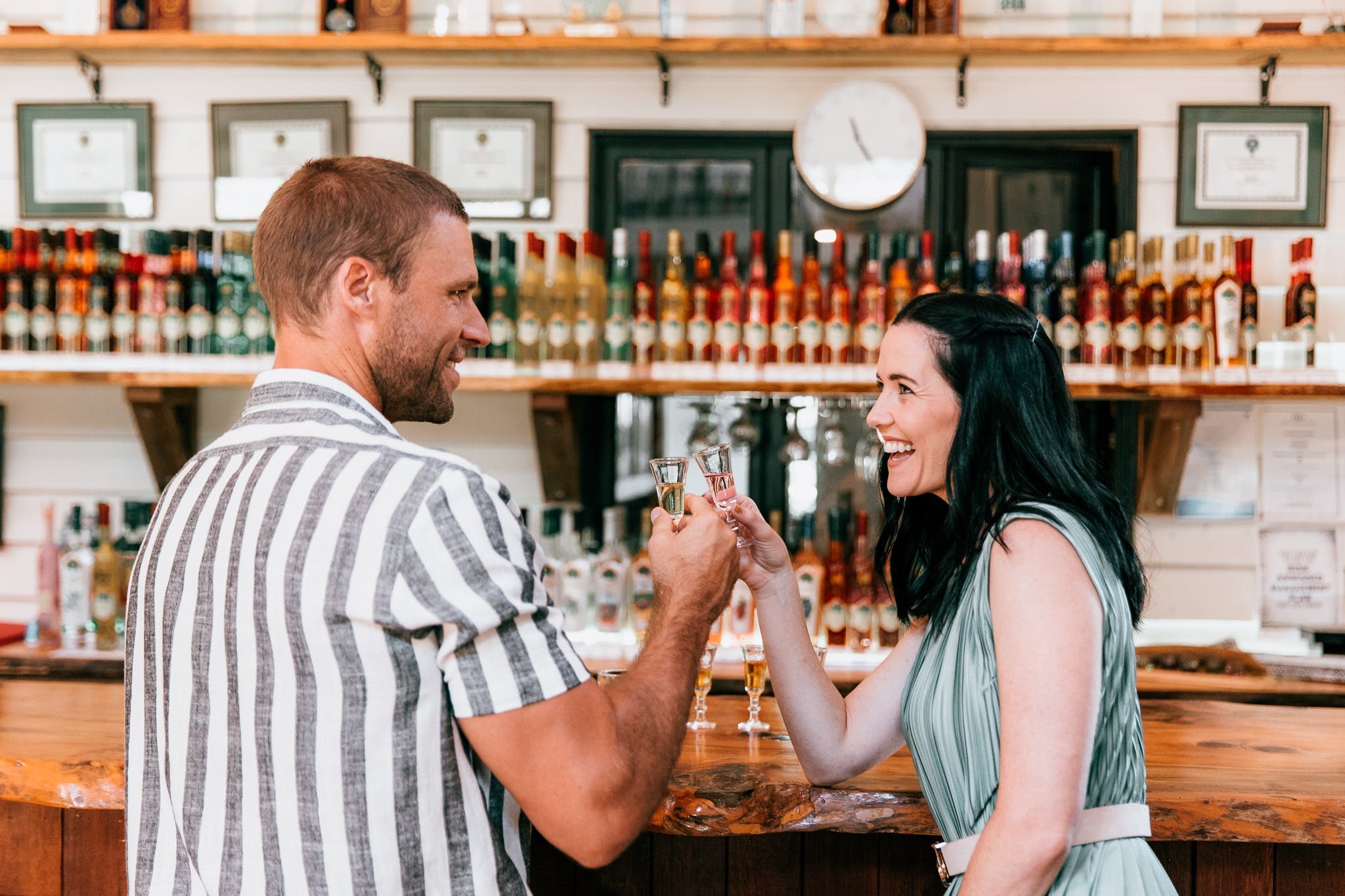 Couple tasting in front of main bar