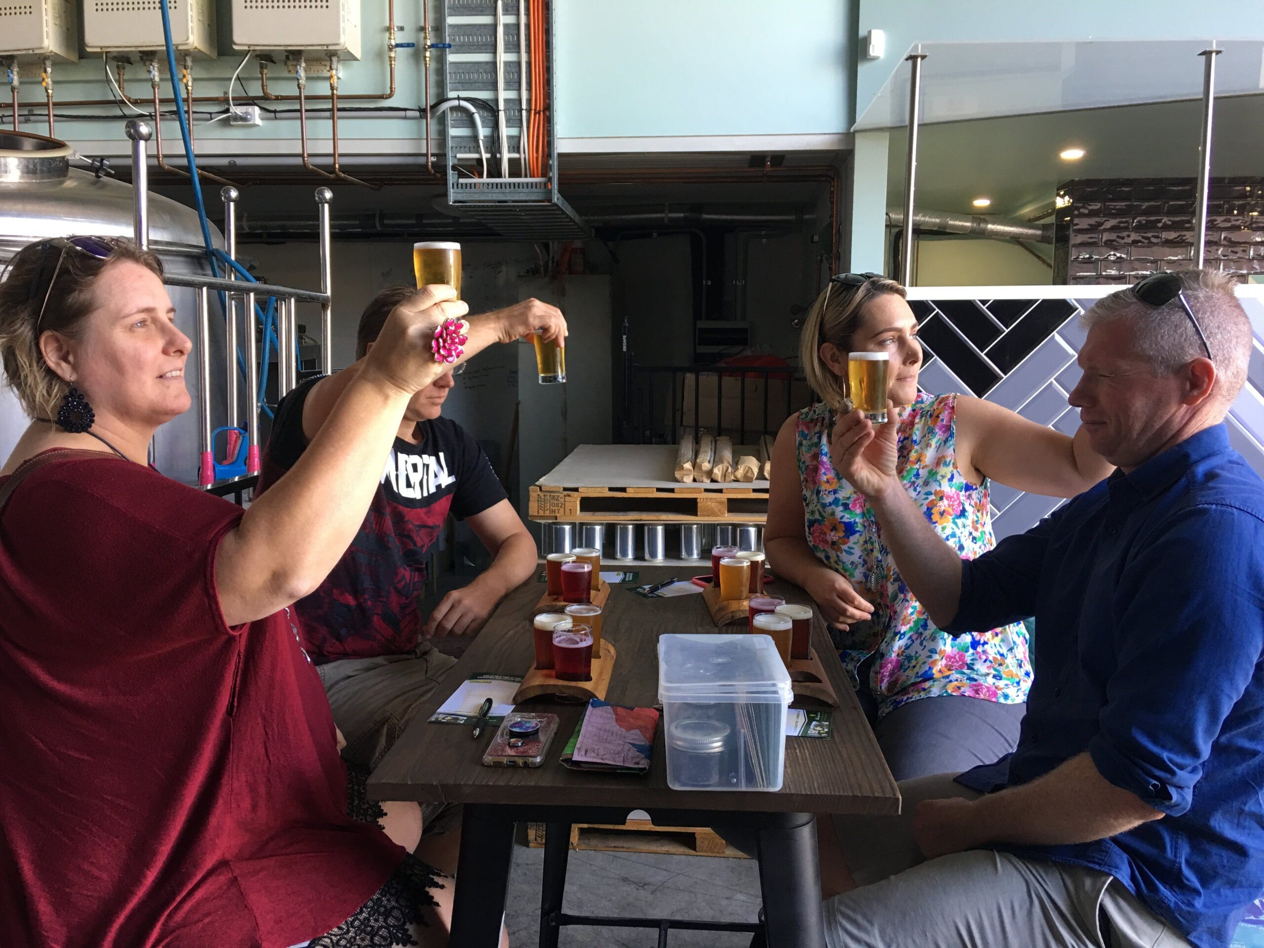 Inspecting the colour of their beer