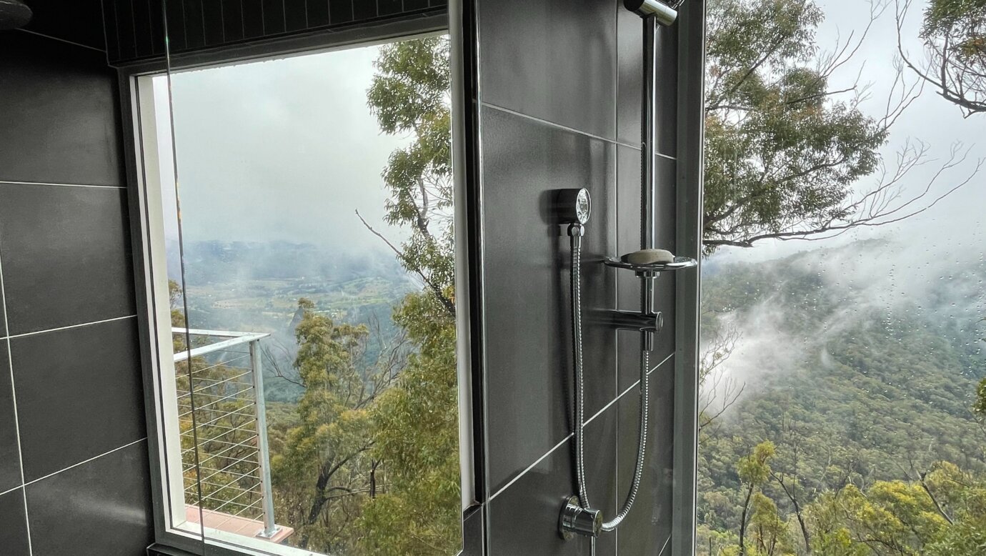 West House Upper bathroom with view reflected in mirror