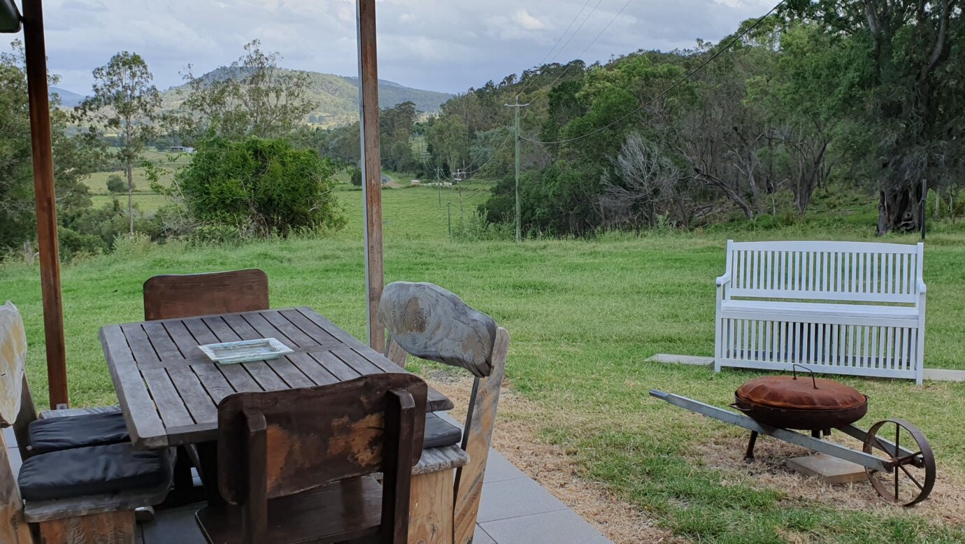 Outdoor dining, fire pit and BBQ at the cottage. Exclusive use for guests of the Eco tent