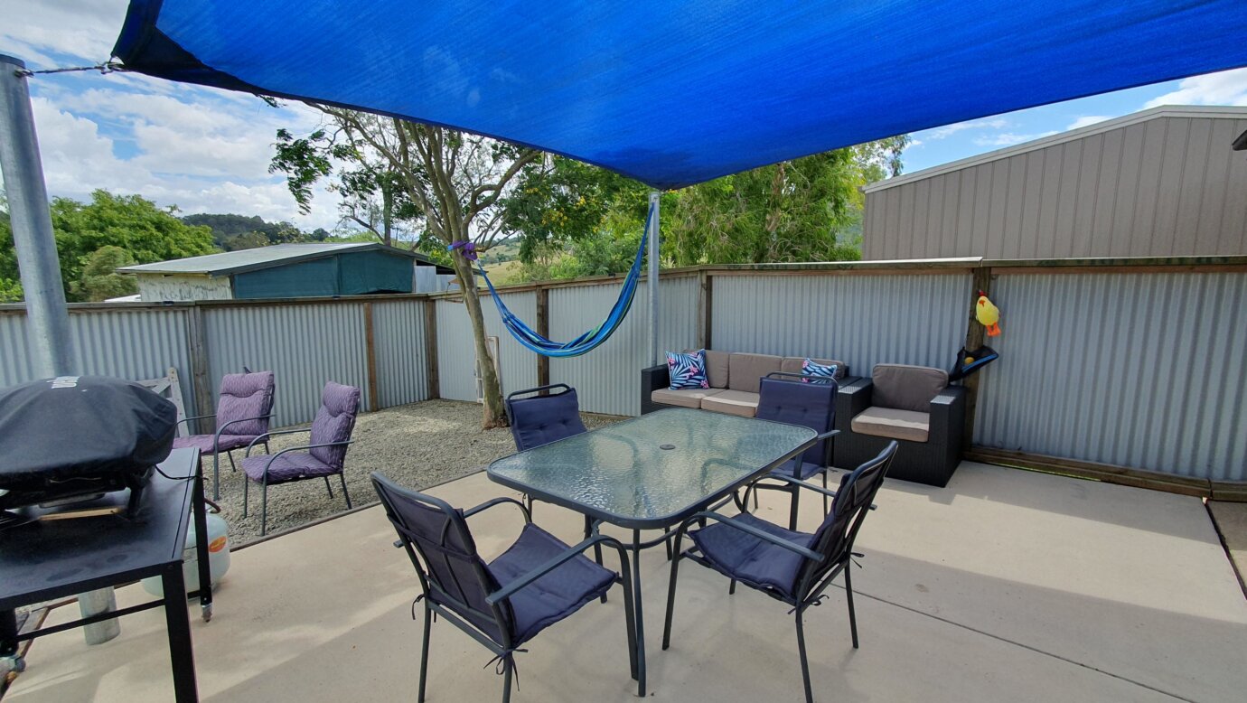 Garden Cottage - outdoor entertainment area with BBQ, firepit and seating