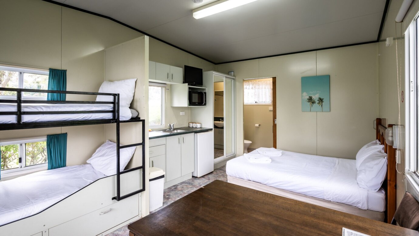 One of our four berth cabins, including a set of bunks, double bed, kitchenette and ensuite.
