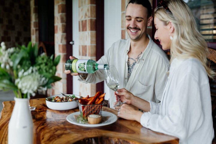 Tamborine hotel getaway Romantic outdoor dining for two amidst stunning natural beauty couple goals