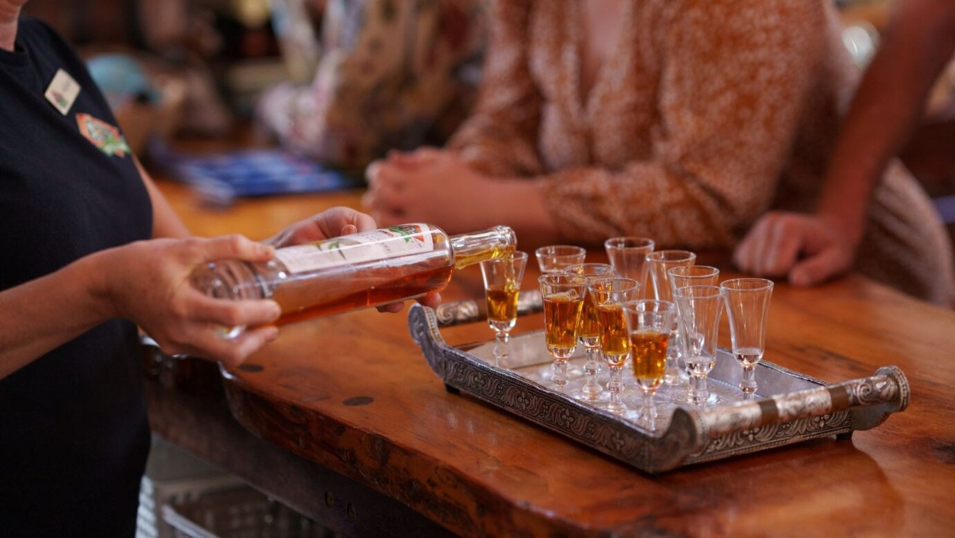 drinks being poured on a bar