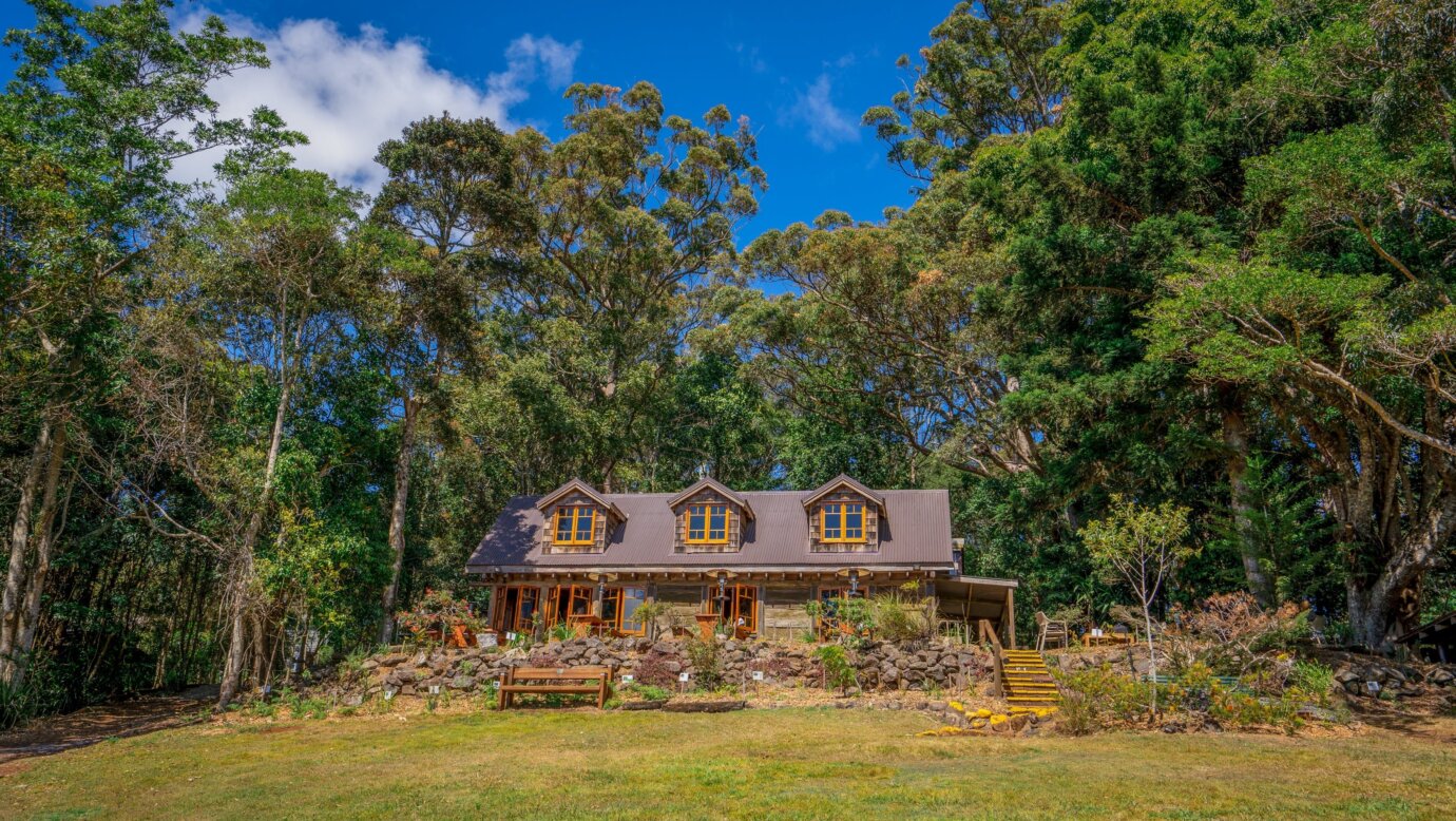 Historic cottage with three windows in gabled roof