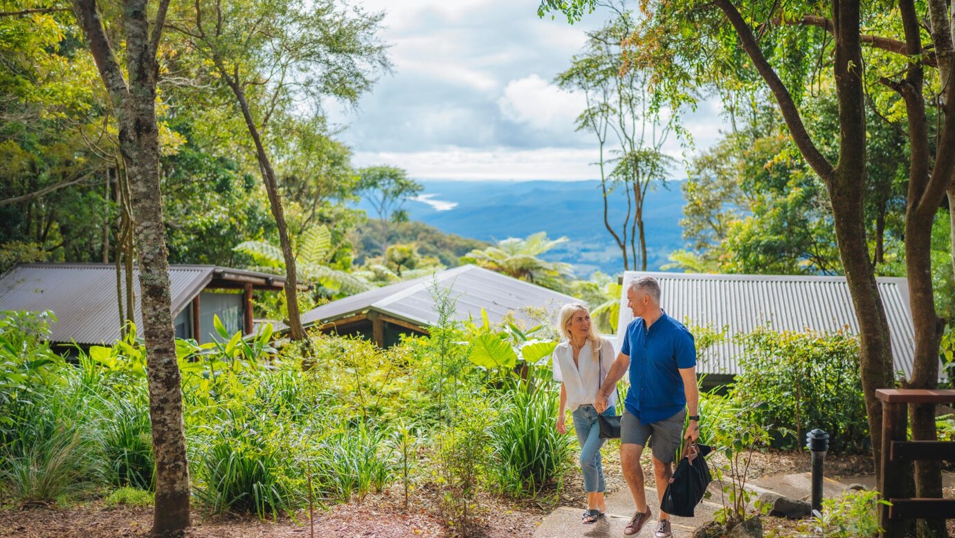 An image of a couple exploring the Binna Burra Campsite