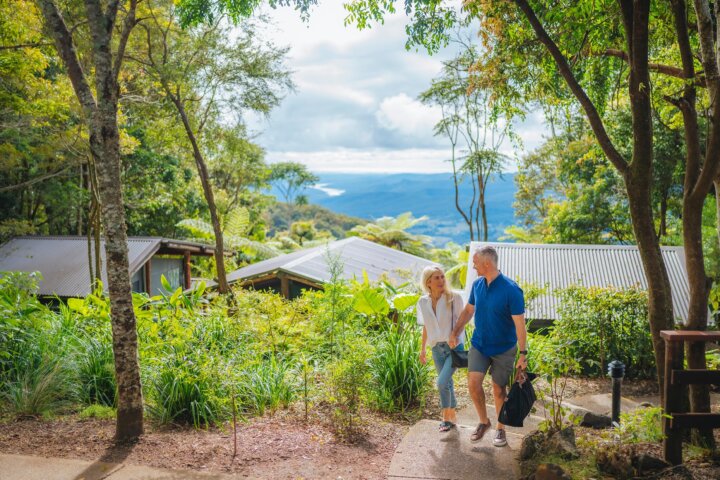 An image of a couple exploring the Binna Burra Campsite