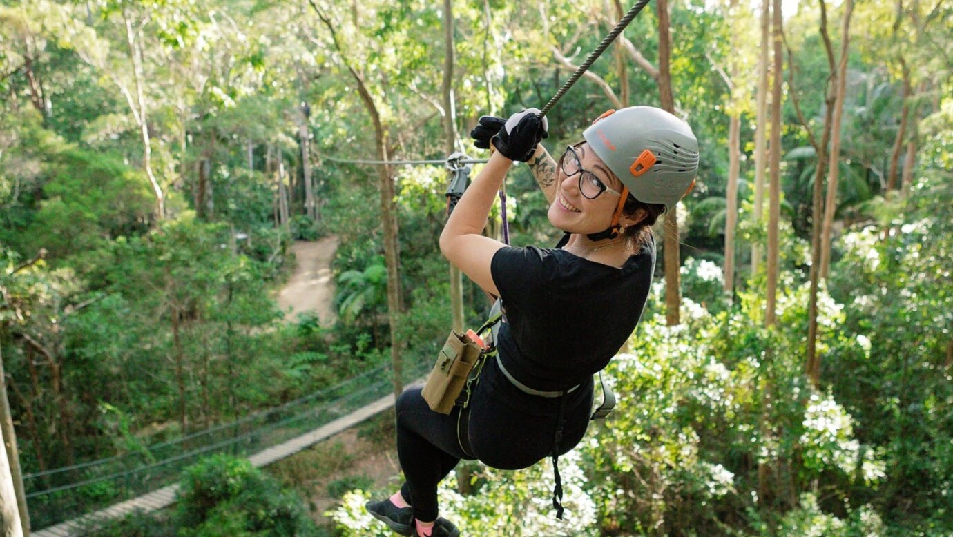 Woman smiling on zipline