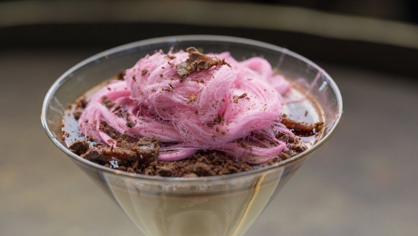 Panna cotta in a martini glass with pink Persian fairy floss