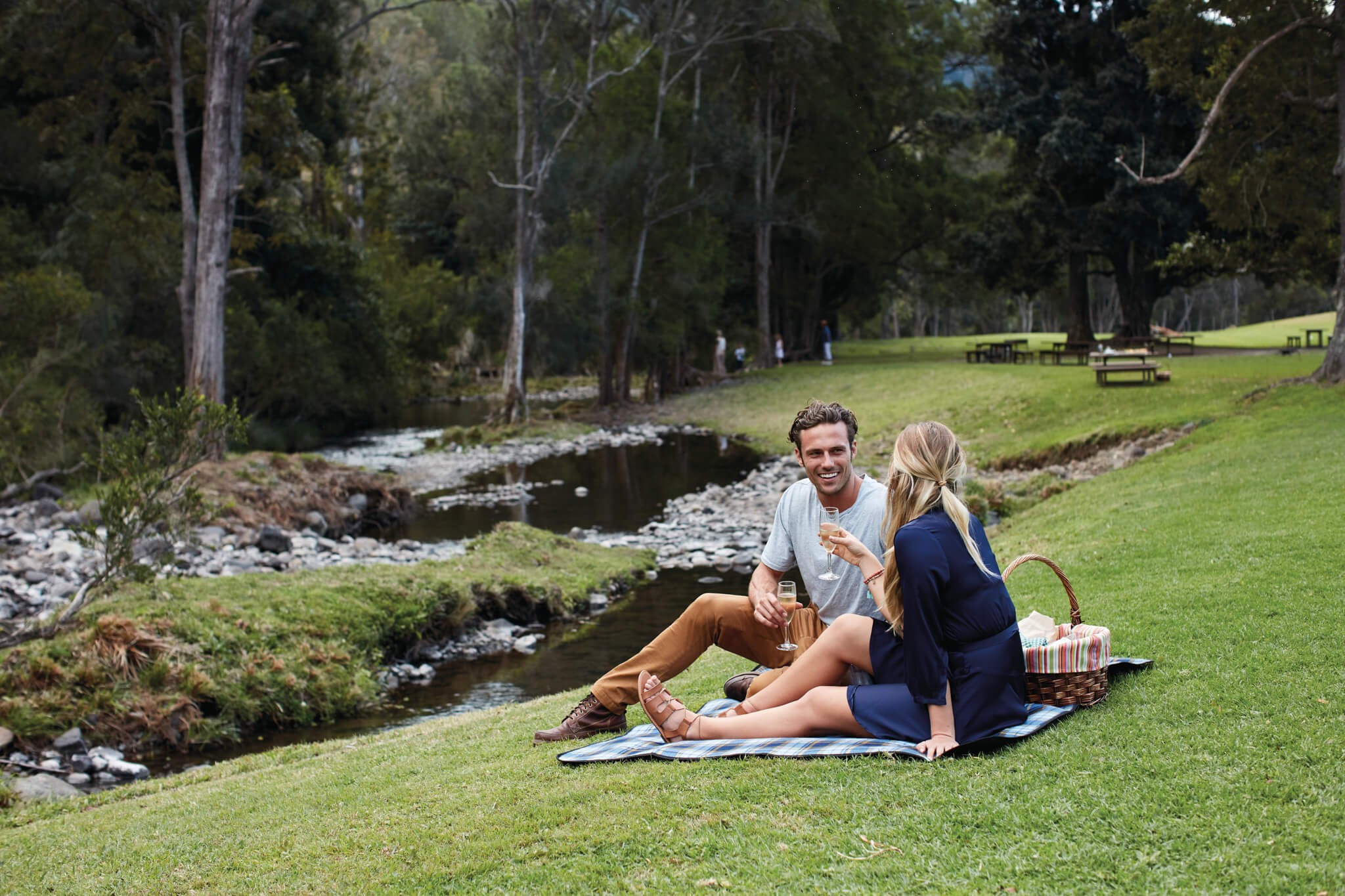 Couple on a picnic at Canungra Valley Vineyards