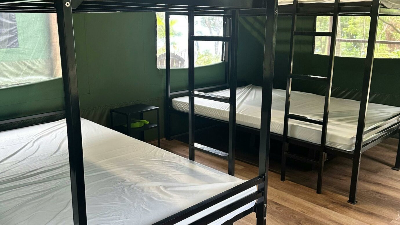 Image shows the interior of the Safari Tents with bunk beds