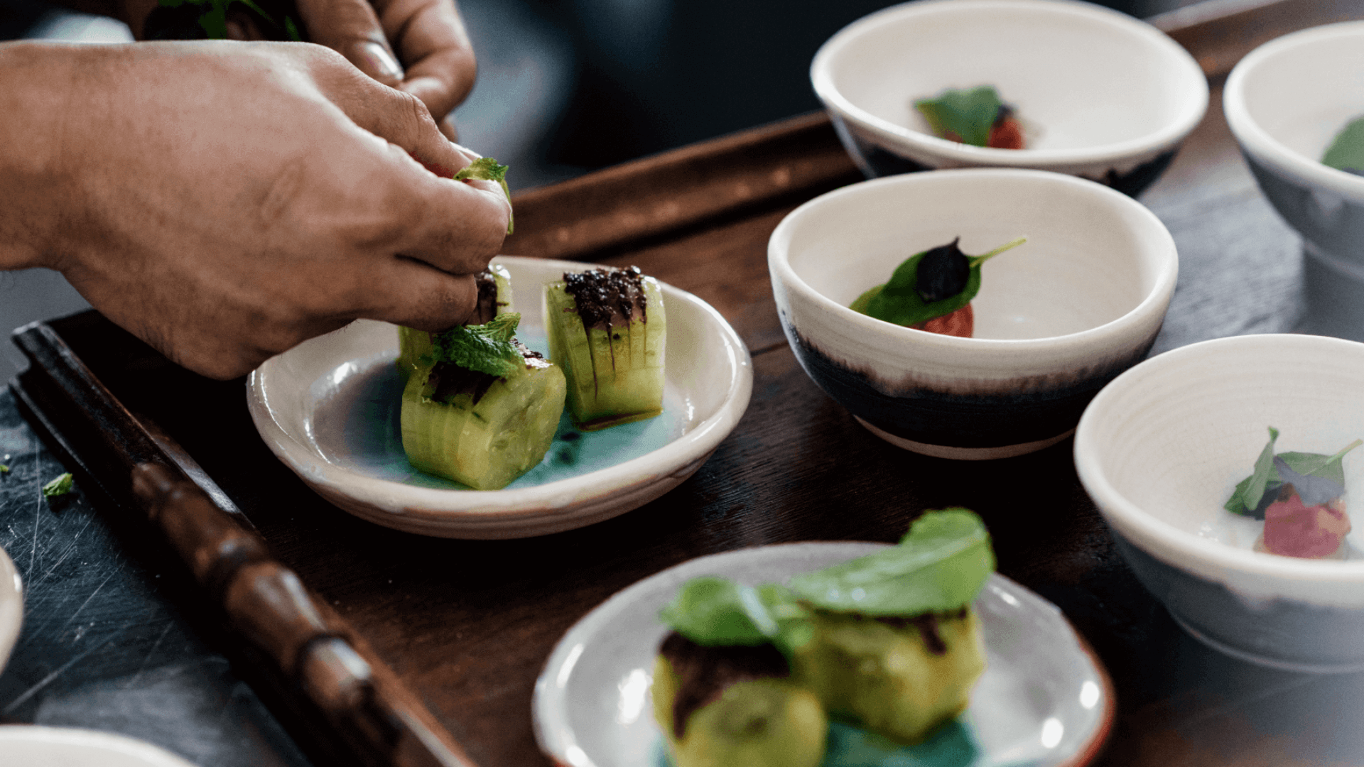 Chefs preparing food at Blume Restaurant