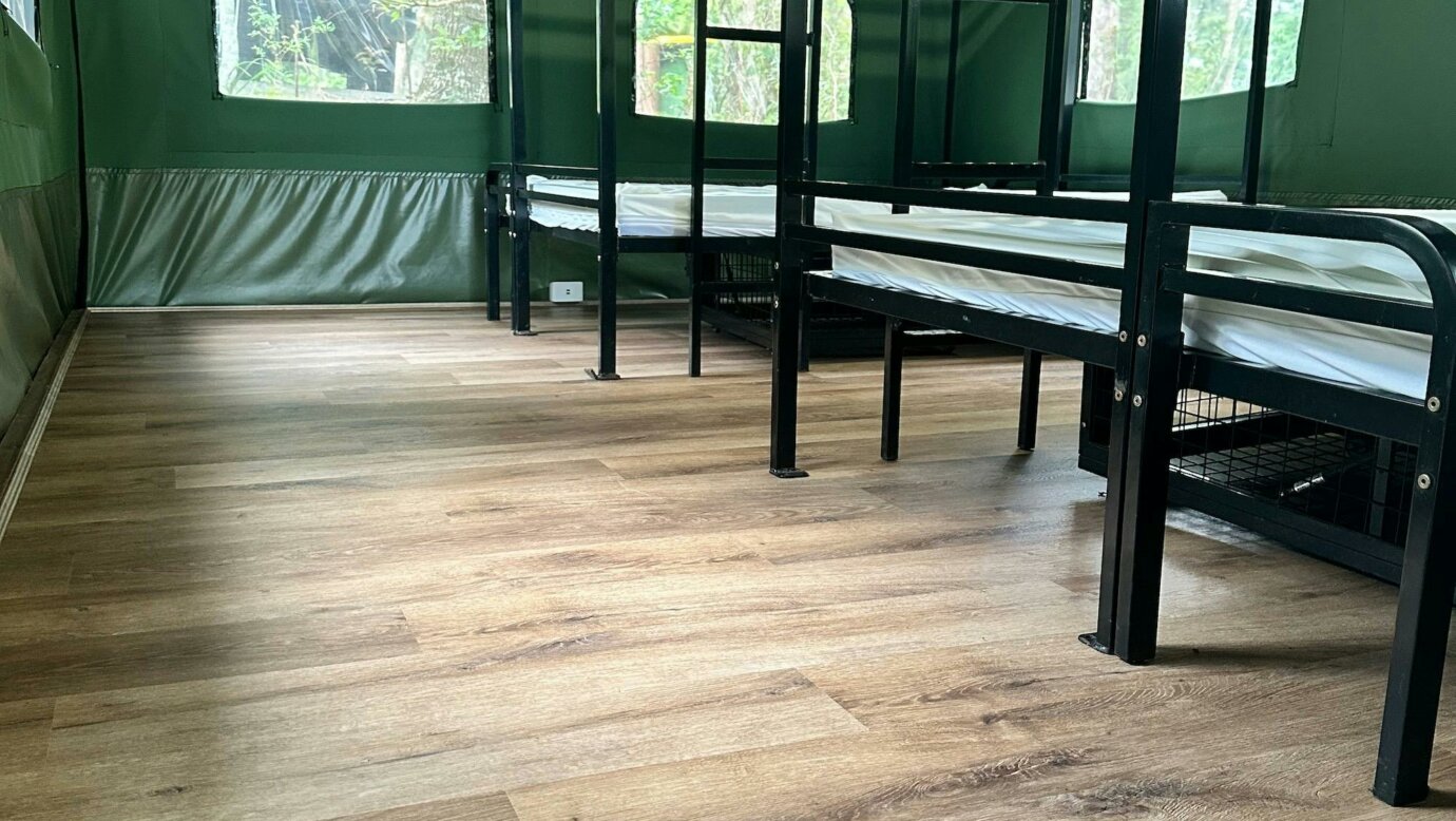Image shows the interior of the Safari Tents with bunk beds