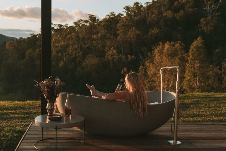 Outdoor bath surrounded by scenic views