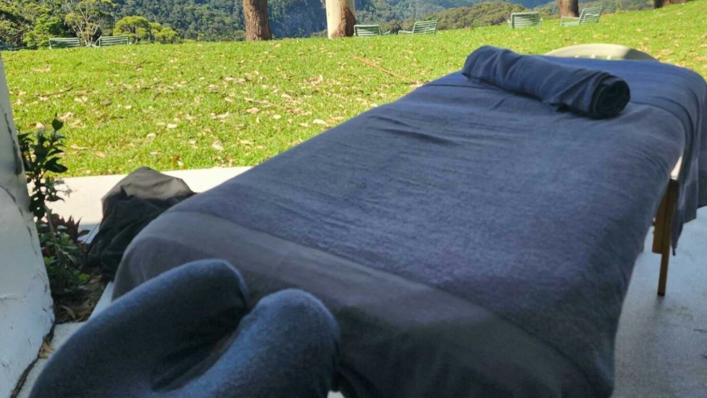 Massage table with view from Tamborine Mountain in background