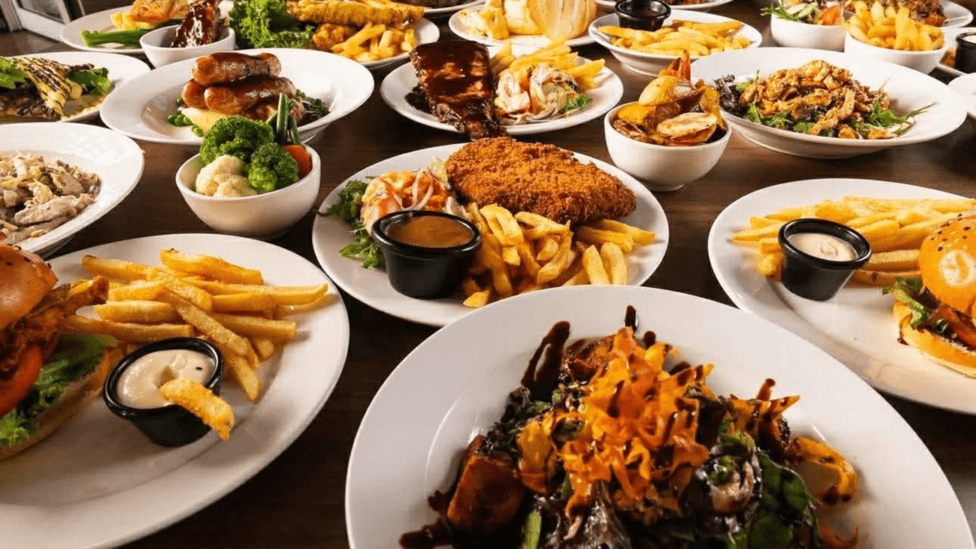 A photo showing multiple dishes at The Railway Hotel