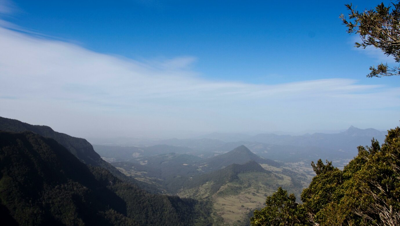 View of valley, mountains and farmland.